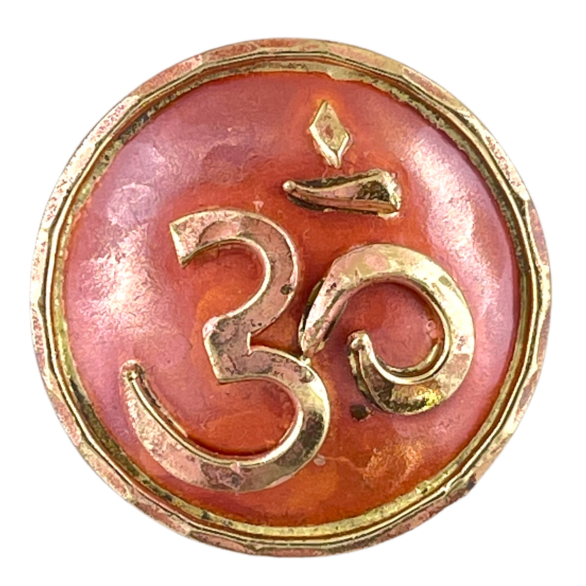 Copper Om pendant with brass detailing, flame-finished in red and orange, handcrafted by Patricia Healey